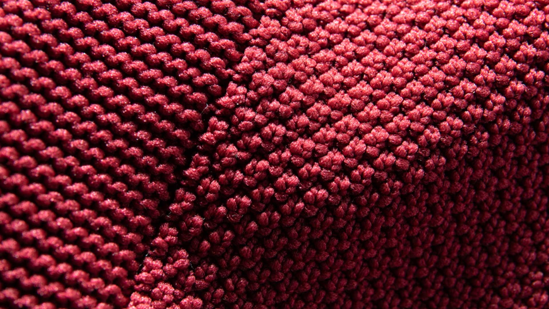 Red fabric stitching